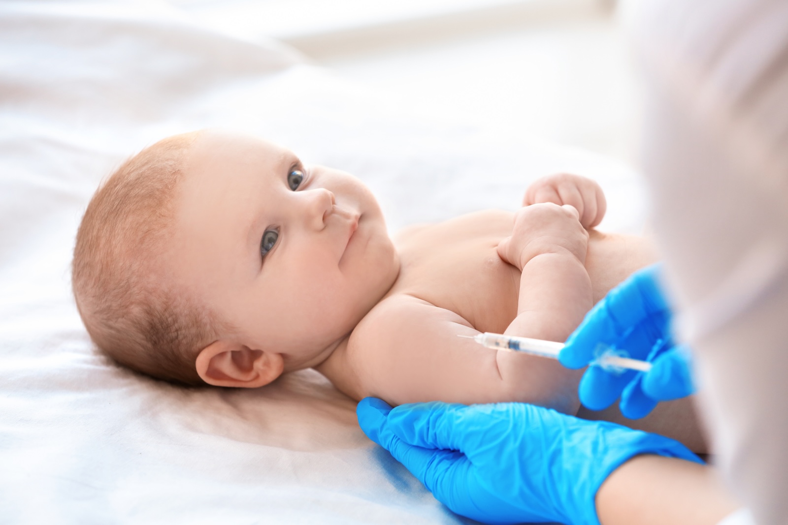 Infant receiving a Vitamin K immunization shot.