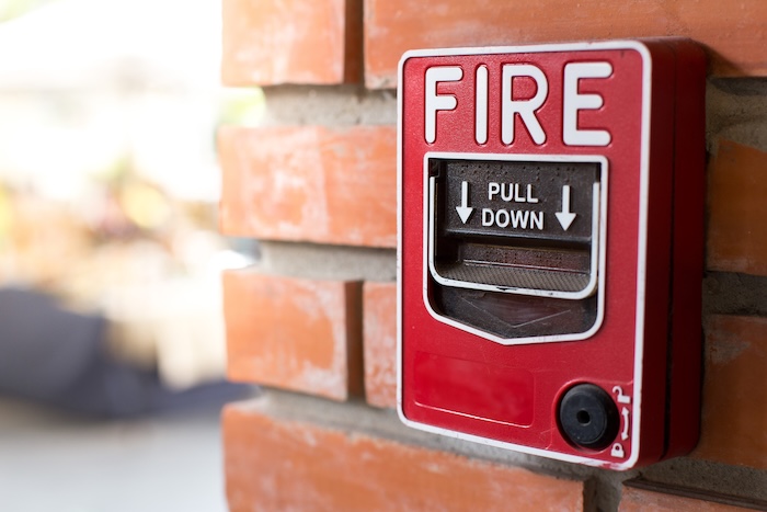 Close up shot of a fire alarm at a school. 