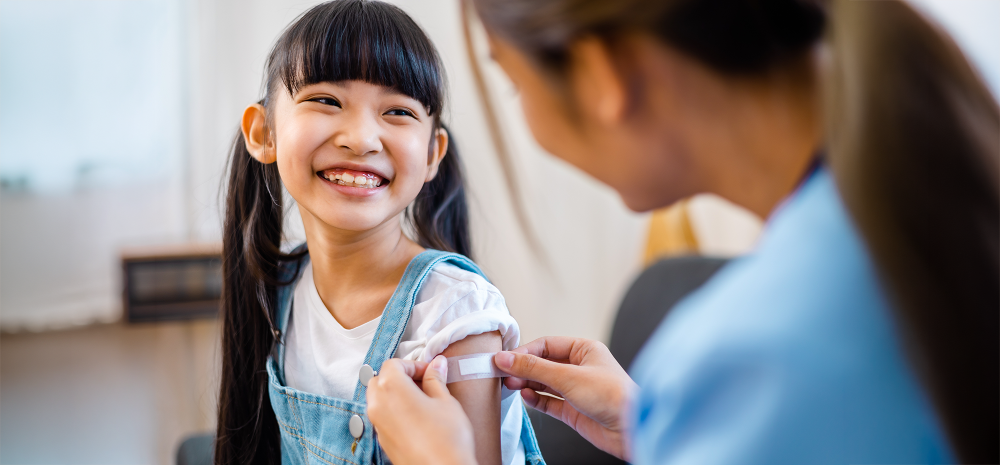 pediatrician vaccinated a kid at a clinic pediatrician-vaccinated-a-kid-at-a-clinic.